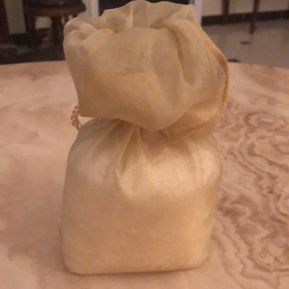 GOLDEN BAG WITH BATH SALTS • TASSEL TIE • UNOPENED